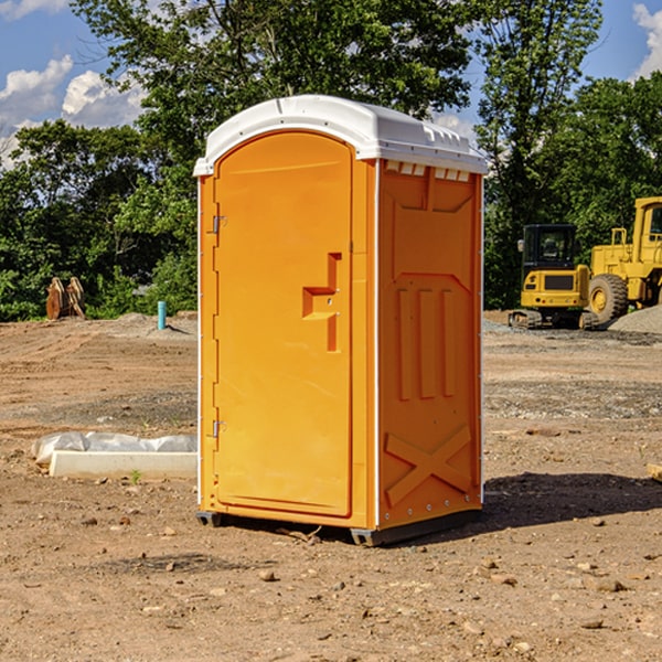 how often are the portable restrooms cleaned and serviced during a rental period in Romance